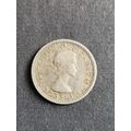 Rhodesia and Nysaland Sixpence 1957 - as per photograph