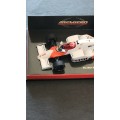 Paul`s Model Art Mini Champs McLaren MP 4/2B Tag Turbo 1985 N. Lauda 1:43 no. 21 -as per photograph