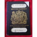 DUEL BRITISH PASSPORT - ISSUED TO 2 RHODESIAN CITIZENS EXPIRED 1975 EXTENDED 1985 (6520)
