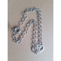 Chunky silver tone fashion necklace with 2 hearts entwined centre piece pendant & lobster clasp