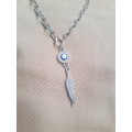 Stunning boho silver tone fashion necklace with diamante evil eye & feather pendant