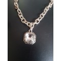 Chunky silver tone fashion necklace with elegant bling square pendant