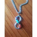 Stainless steel necklace with unique infinity chakra gemstone pendant