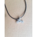 Black leather cord necklace with motorbike pendant