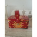 Cute little red tin with handle - sun & moon design
