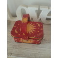 Cute little red tin with handle - sun & moon design