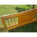Vintage yellow wood headboard for a queen sized bed Selling for R10,000