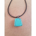 Black faux leather waxed cord necklace with imitation turquoise gemstone nugget pendant The necklace