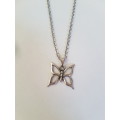 Silver tone fashion necklace with butterfly pendant