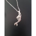 Silver tone fashion necklace with cute mermaid pendant