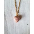 Gold tone fashion necklace with natural rhodochrosite gemstone heart shape pendant