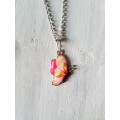 Silver tone fashion necklace with pink enamel butterfly pendant