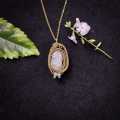 Rainbow Moonstone With Aquamarine Chips In Brass Pendant Necklace