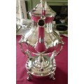 Silver plated tea kettle on stand