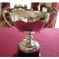 Large silver plated trophy on stand