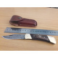 Handmade Damascus steel folding knife with Wooden handle scales. I CAN SEND PARCELS.