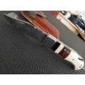 Handmade Damascus steel folding knife with CAMEL BONE and WOODEN handle scales.