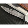 Handmade Damascus steel folding knife with CAMEL BONE handle scales.