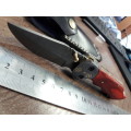 Handmade Damascus steel folding knife with WOODEN handle scales.  What you see is what you get.