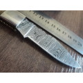 Handmade Damascus steel folding knife with RAM HORN handle scales.