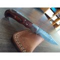 Handmade Damascus steel folding knife with MICARTA handle scales. THIS AUCTION will only ship 28th