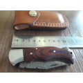 Handmade Damascus steel folding knife with MICARTA handle scales. THIS AUCTION will only ship 28th