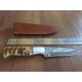 Handmade Damascus steel HUNTING  knife with RAM HORN handle scales. NEW STOCK!! !