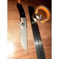 Damascus VG-10 Stainless Steel folding knife, RAZOR Sharp, EBONY handle scales, bolster engraved.