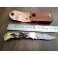 Handmade Damascus steel folding knife w Camel Bone Handle Scales. Leather pouch is FREE.