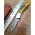 Handmade Damascus steel folding knife w Epoxy Handle Scales. New stock !!