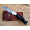 Handmade Damascus steel folding knife w  Bull Horn Handle Scales. New stock !!