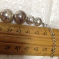 Necklace graduating Metal spherical shape beads