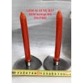 2 stainless steel candle holders and 2 red candles not used