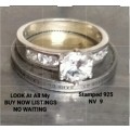 stamped 925 NV 9  * Sterling Nevada Silver mine size 9l  clear stone big middle each side 3 small