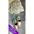 Circa 1960`sBROOCH GRAHAMSTOWN Coat of Arms 2 Dangling clogs charms made in HOLLAND