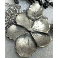 NECKLACE -Flower Silver Tone Metal small central stone Cord has black faceted beads LOOK At My BUY