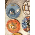 7 Pokémon Tazos + 1 other from another collection to yours