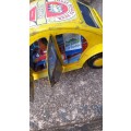 Yellow Heinekin VW Beetle Tin Car imported from Madagascar