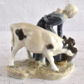 Royal Copenhagen Milkmaid Feeding Cow Figure