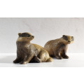 A beautiful pair of modelled and appealing stoneware badgers from Poole Pottery.