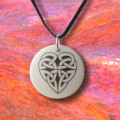 Celtic art, heart design ceramic pendant. Handcrafted porcelain jewellery.