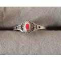 Sterling Silver Ring with Red Stone. 1.8g. Size O.