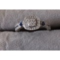 Sterling Silver Ring with CZ & Blue Stones. 2.8g. Size T.
