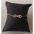 Sterling Silver Infinity Bracelet with Marcasite`s. 1.8g. 20cm.