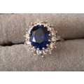 Sterling Silver Ring with Bue Crystal & CZ. 3.97g. Size O.
