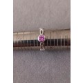STERLING SILVER BEZEL RING WITH PINK STONE. 2.1g. SIZE S.