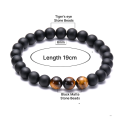 Black stone and tiger`s eye beads bracelet