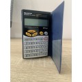 Sharp EL-480SR  handheld calculator with several useful features: