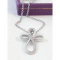Sterling silver cross pendant on chain