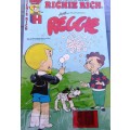 SCARCE COMIC `RICHIE RICH AND REGGIE` IN SEALED PLASTIC COVER.